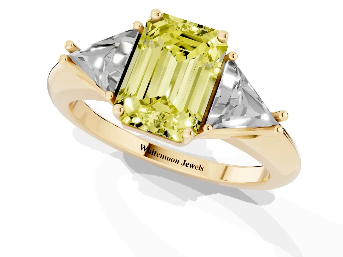 Fancy Yellow Three-Stone Emerald Cut Diamond Engagement Ring with Trillion Side Stones and Prong Setting Yellow gold