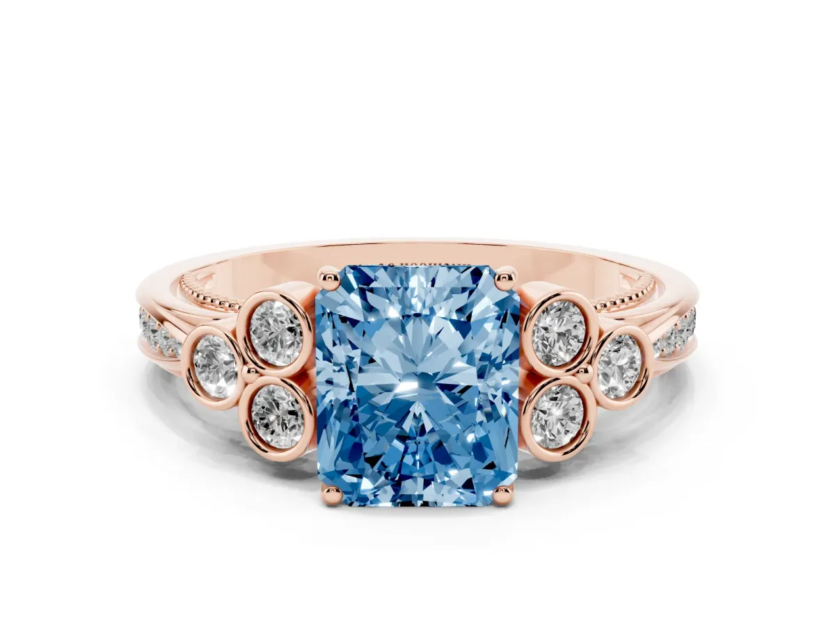 Fancy Blue Radiant Cut Cut Diamond Engagement Ring with Bezel Set Round Side Stones and Prong Setting Rose gold