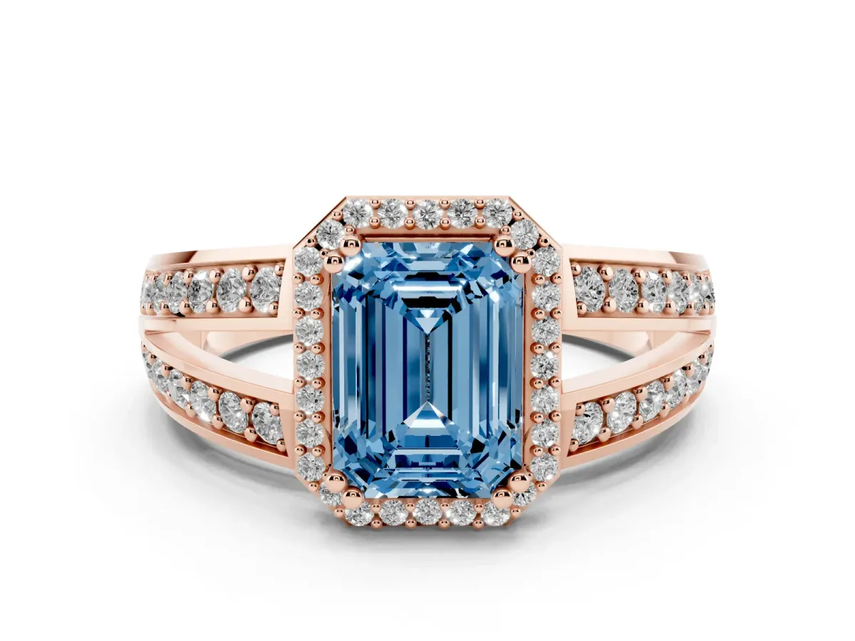 Fancy Blue Emerald Cut Diamond Halo Ring with Split Shank Pavé Band and Four-Prong Setting Rose gold