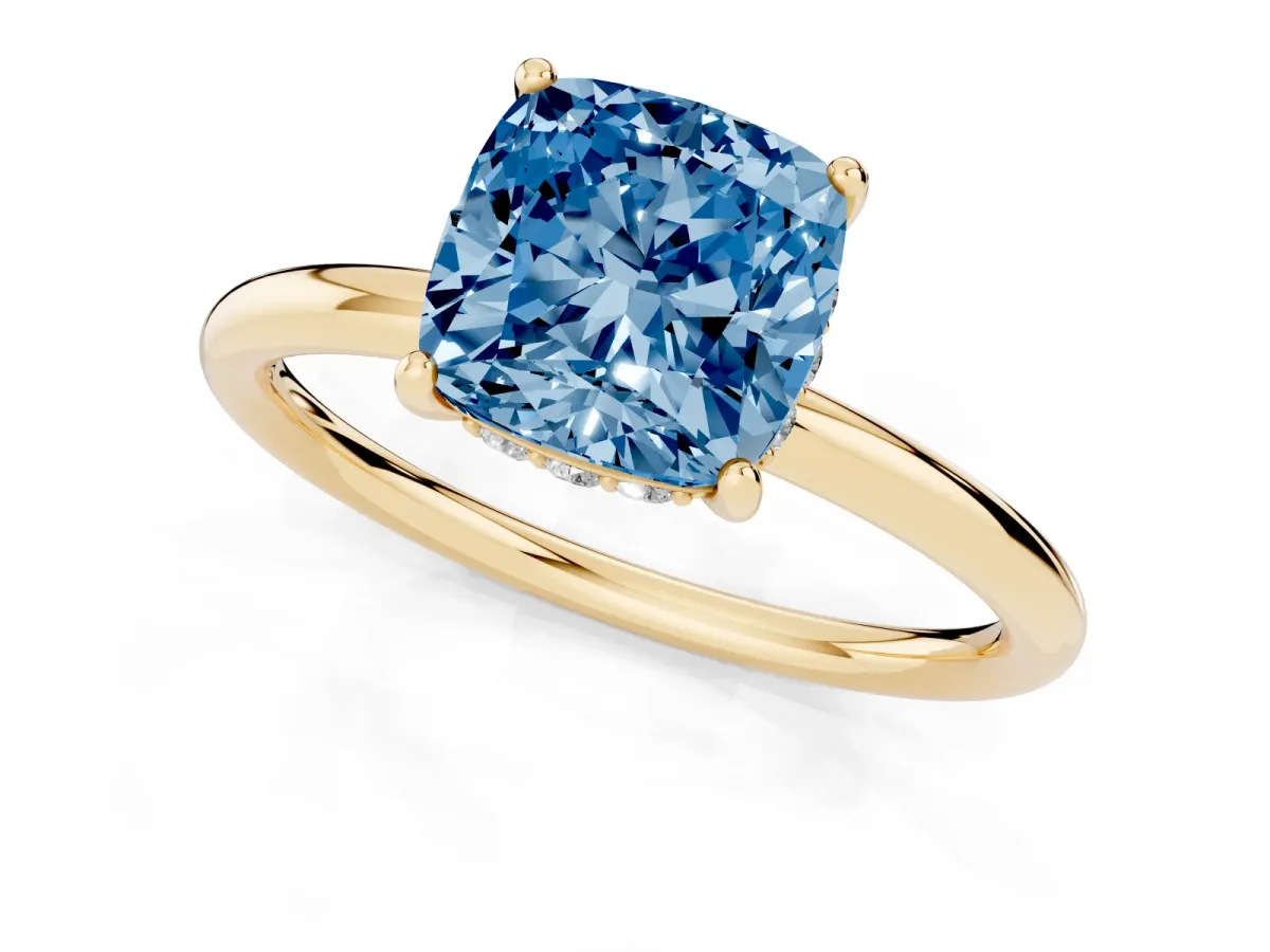 Fancy Blue Cushion Cut Solitaire Diamond Ring with a Classic Band and Four-Prong Setting Yellow gold