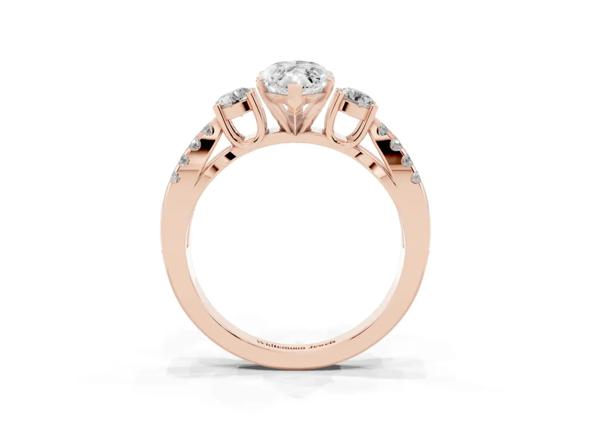 Marquise Cut Diamond Three-Stone Ring with Pavé Split Shank and Four-Prong Setting Rose gold