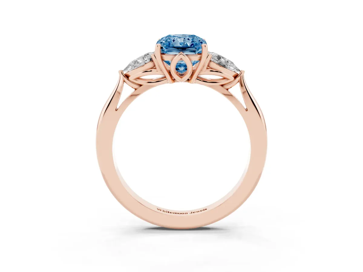 Fancy Blue Radiant Cut Diamond Three-Stone Ring with Pear Side Stones and Prong Setting Rose gold