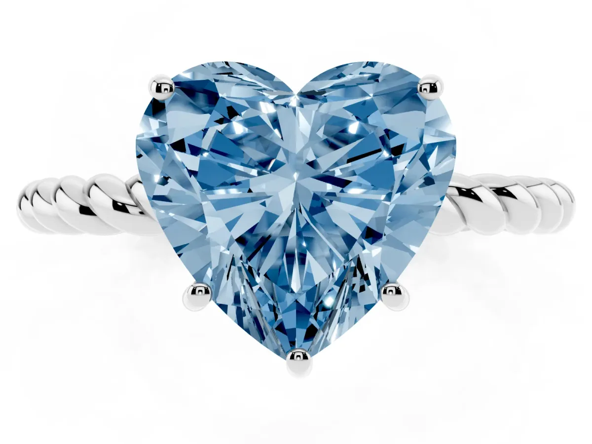 Fancy Blue Heart Cut Solitaire Twist Band Ring with Four-Prong Setting Platinum
