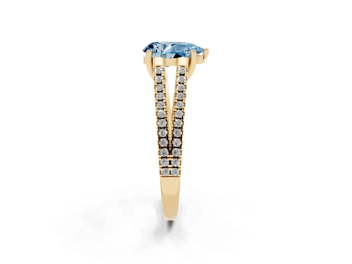 Fancy Blue Pear Cut Diamond Solitaire Engagement Ring with Split Shank Pavé Band Yellow gold