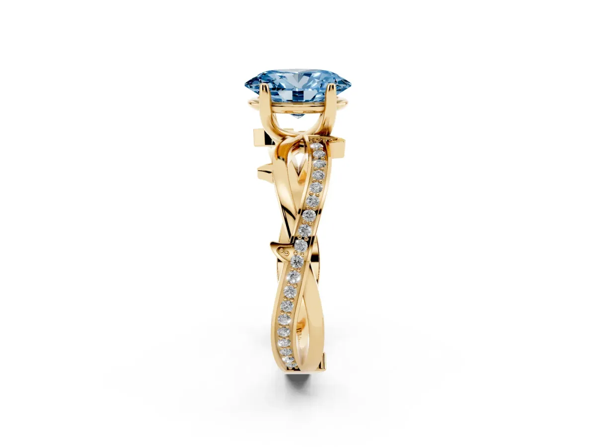 Fancy Blue Oval Cut Solitaire Twist Band with Pavé Accents and Four-Prong Setting Yellow gold