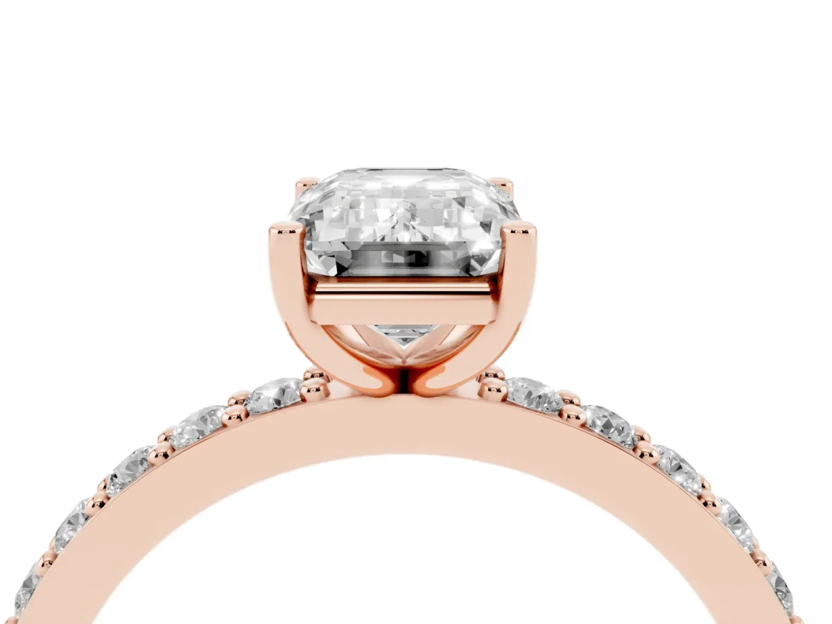Emerald Cut Cut Diamond Solitaire with Pave Band and Four-Prong Setting Rose gold