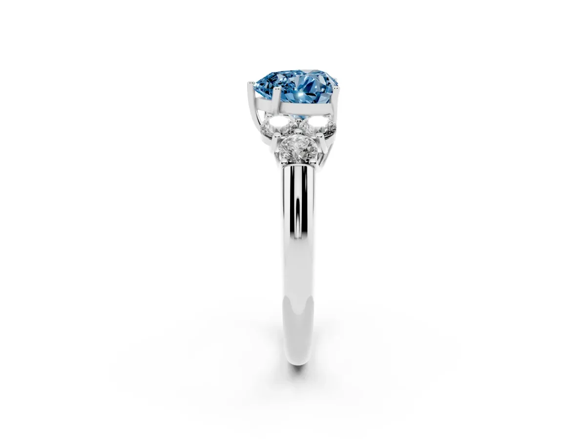 Fancy Blue Heart Cut Cut Diamond Cluster Ring with Round Accent Stones and Prong Setting on a Classic Band White gold
