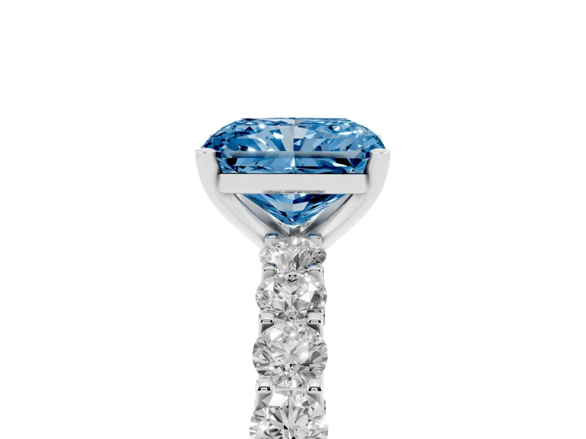 Fancy Blue Radiant Cut Diamond Solitaire Ring with Shared Prong Pavé Band and Four-Prong Setting Silver