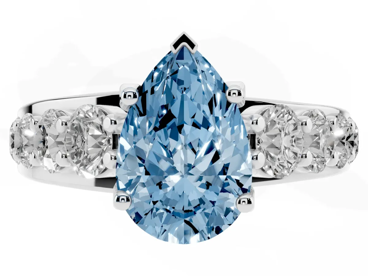 Fancy Blue Pear Cut Diamond Engagement Ring with Pavé Band and Four-Prong Setting Silver