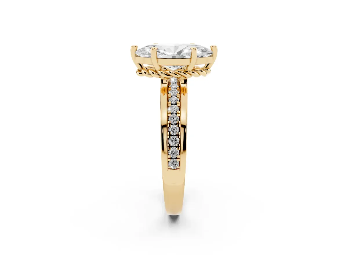 Marquise Cut Solitaire Diamond Ring with Channel Set Band and Six-Prong Setting Yellow gold