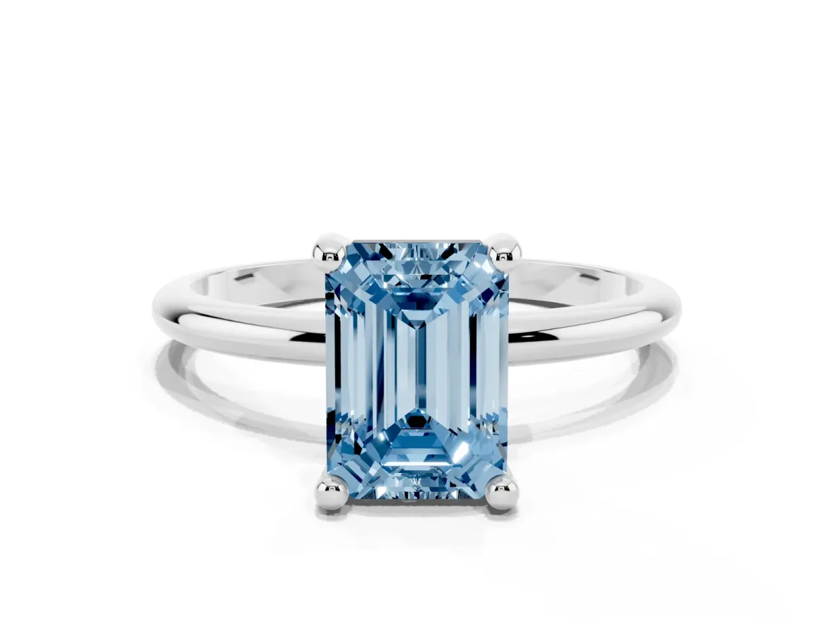 Fancy Blue Emerald Cut Solitaire Diamond Ring with 4-Prong Setting on a Classic Band Platinum