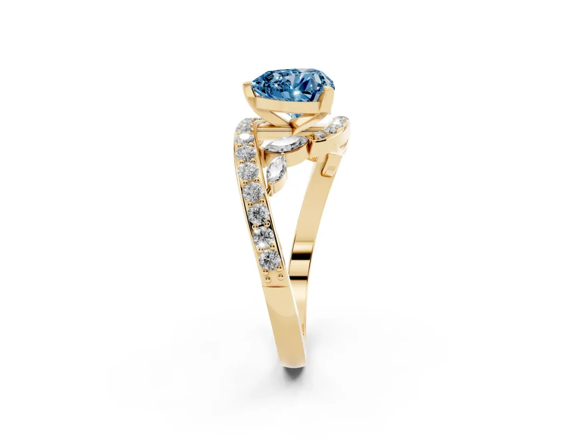 Fancy Blue Heart Cut Solitaire with Pavé Twist Band and Four-Prong Setting Yellow gold