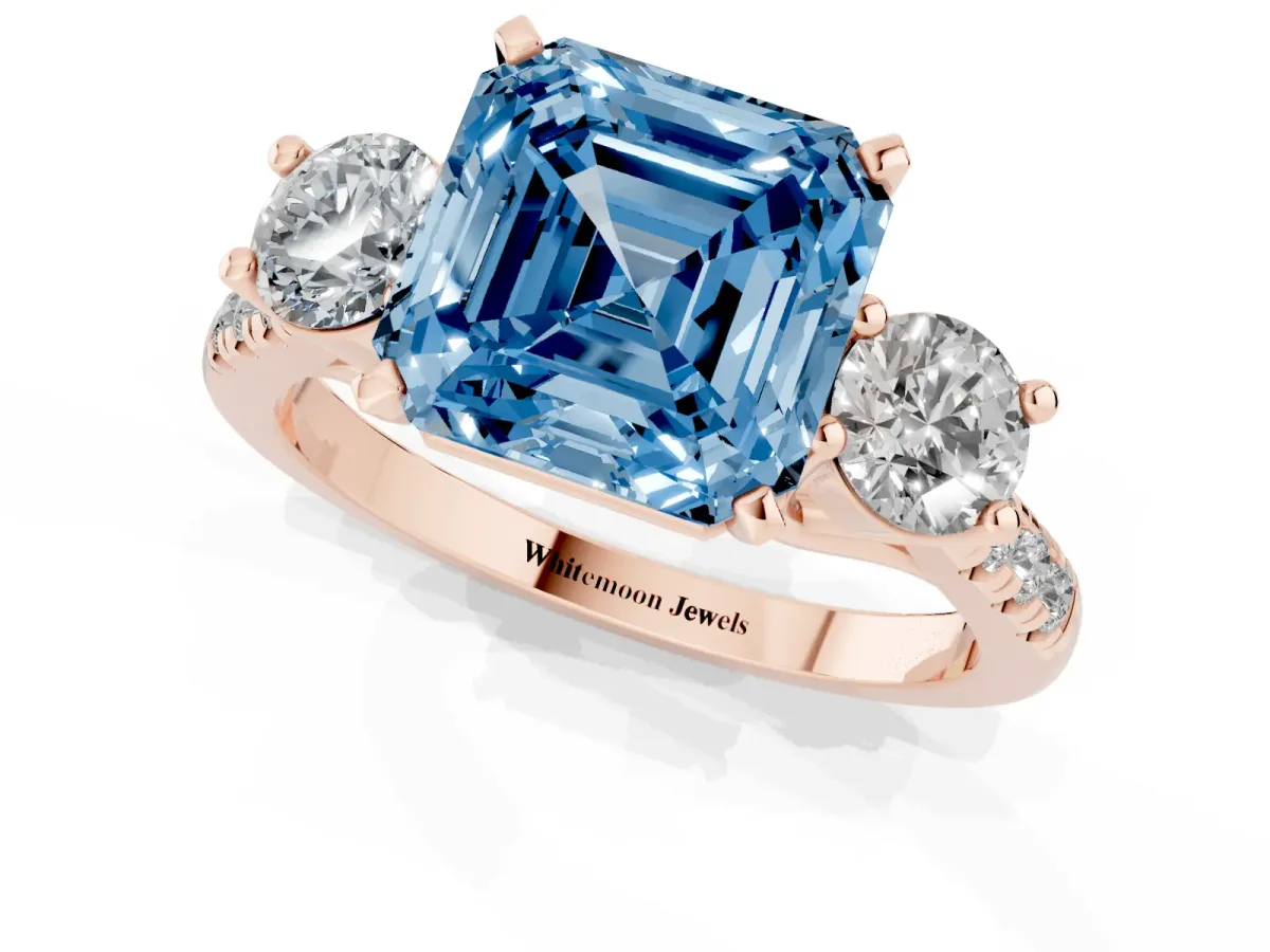 Fancy Blue Three-Stone Asscher Cut Diamond Pavé Band with Four-Prong Setting Rose gold