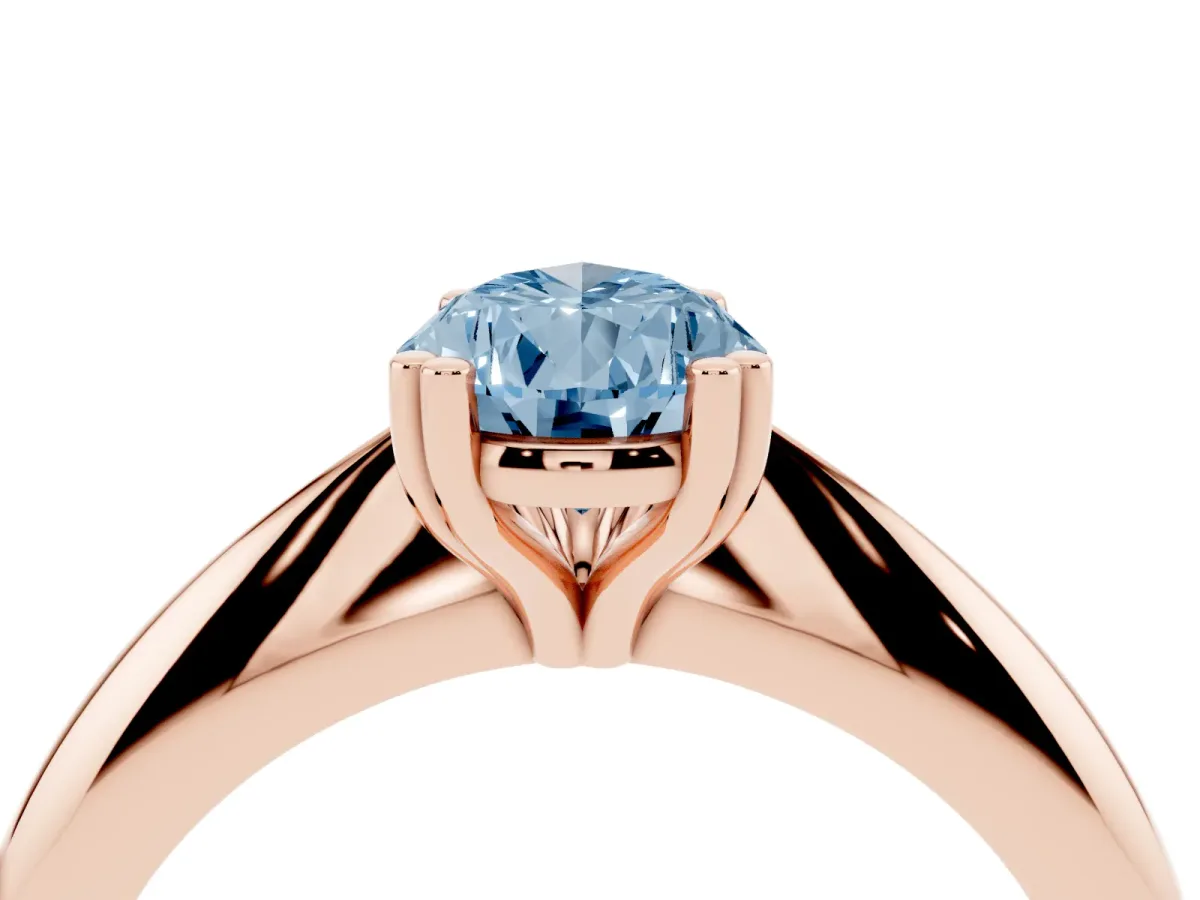 Fancy Blue Pear Cut Cut Solitaire Engagement Ring with Tapered Band and Four-Prong Setting Rose gold