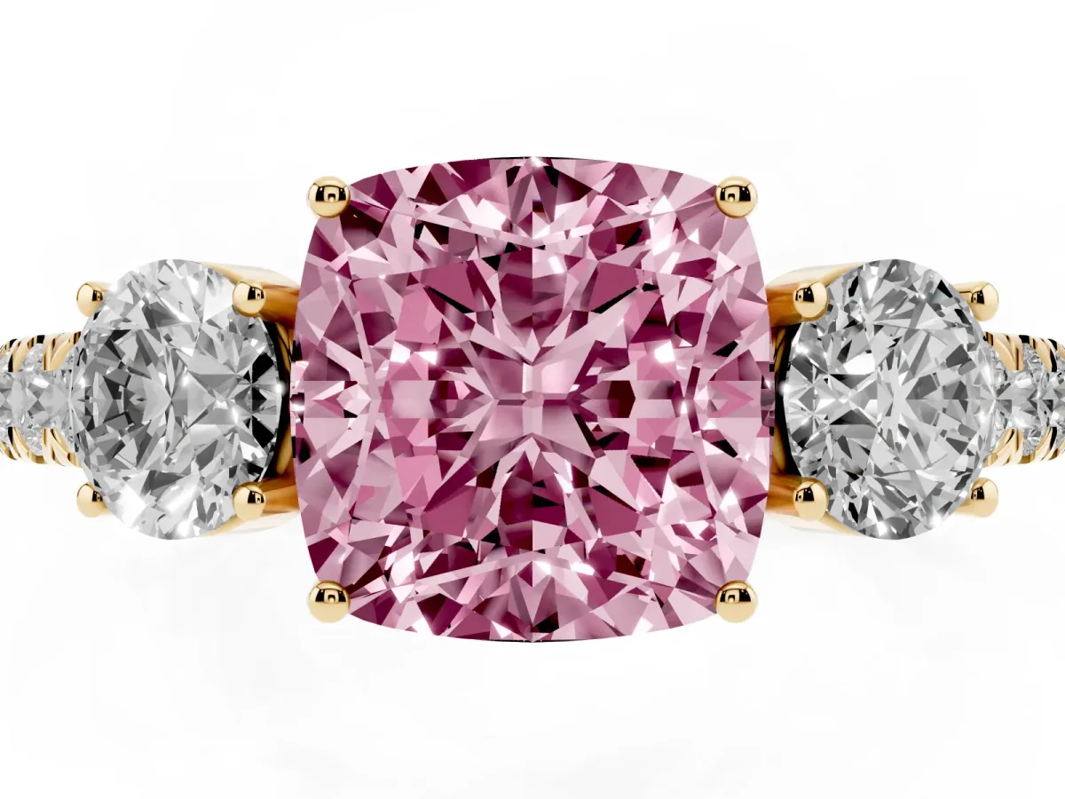 Fancy Pink Cushion Cut Cut Diamond Three-Stone Ring with Round Side Stones and Pavé Band Yellow gold
