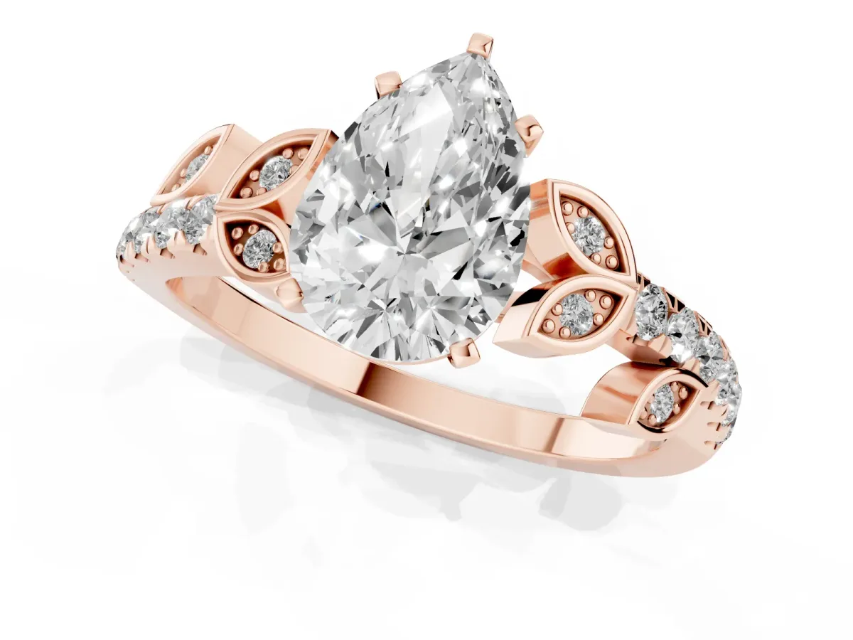 Pear Cut Solitaire Leaf-Inspired Diamond Ring with Pavé Band and Four-Prong Setting Rose gold
