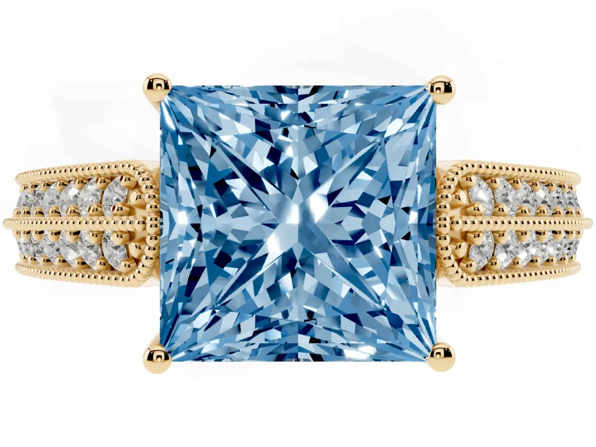 Fancy Blue Princess Cut Cut Pave Split Shank Engagement Ring with Four-Prong Setting Yellow gold