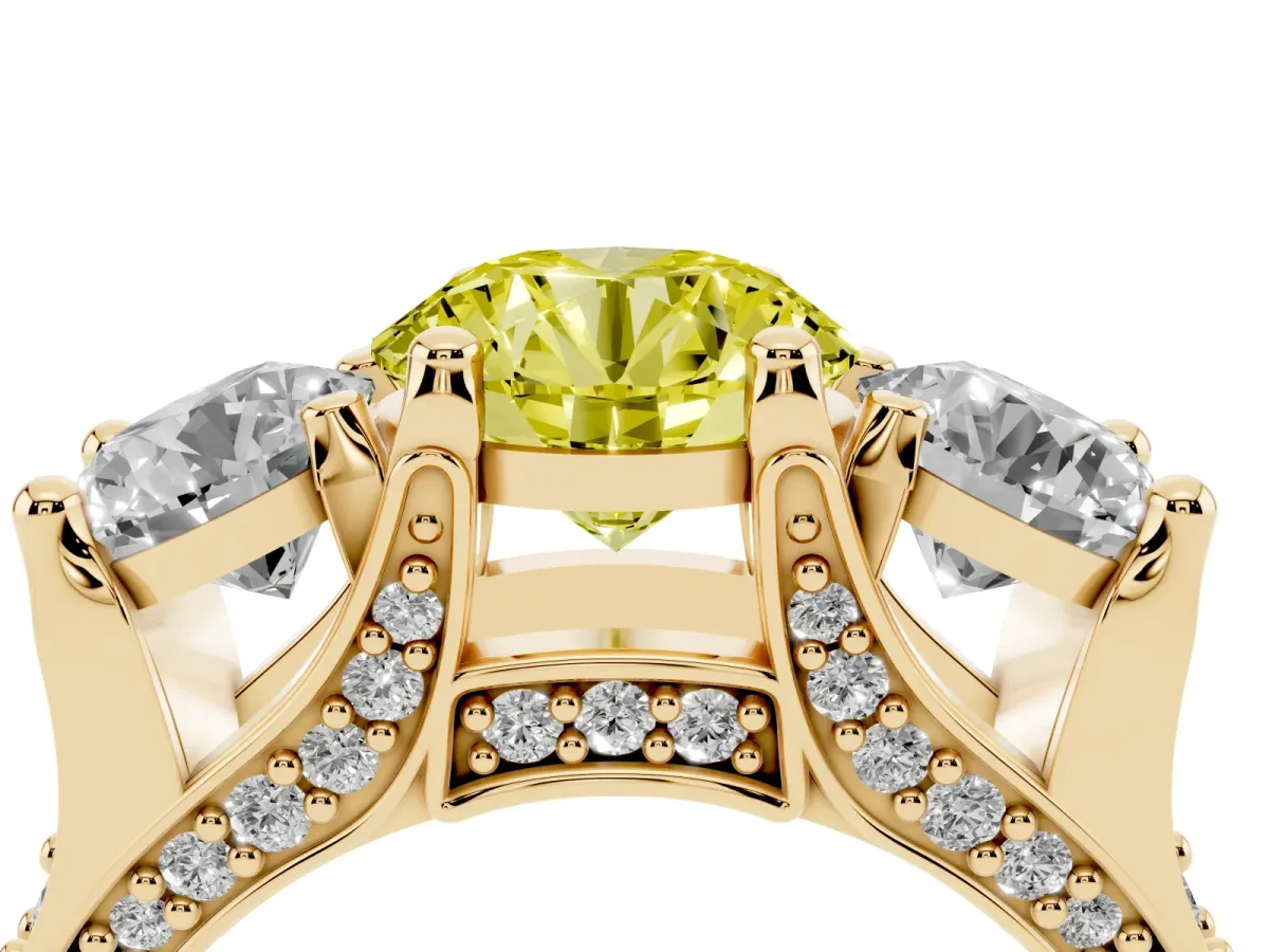 Fancy Yellow Round Cut Diamond Three-Stone Ring with Channel Set Band and Four-Prong Setting Yellow gold