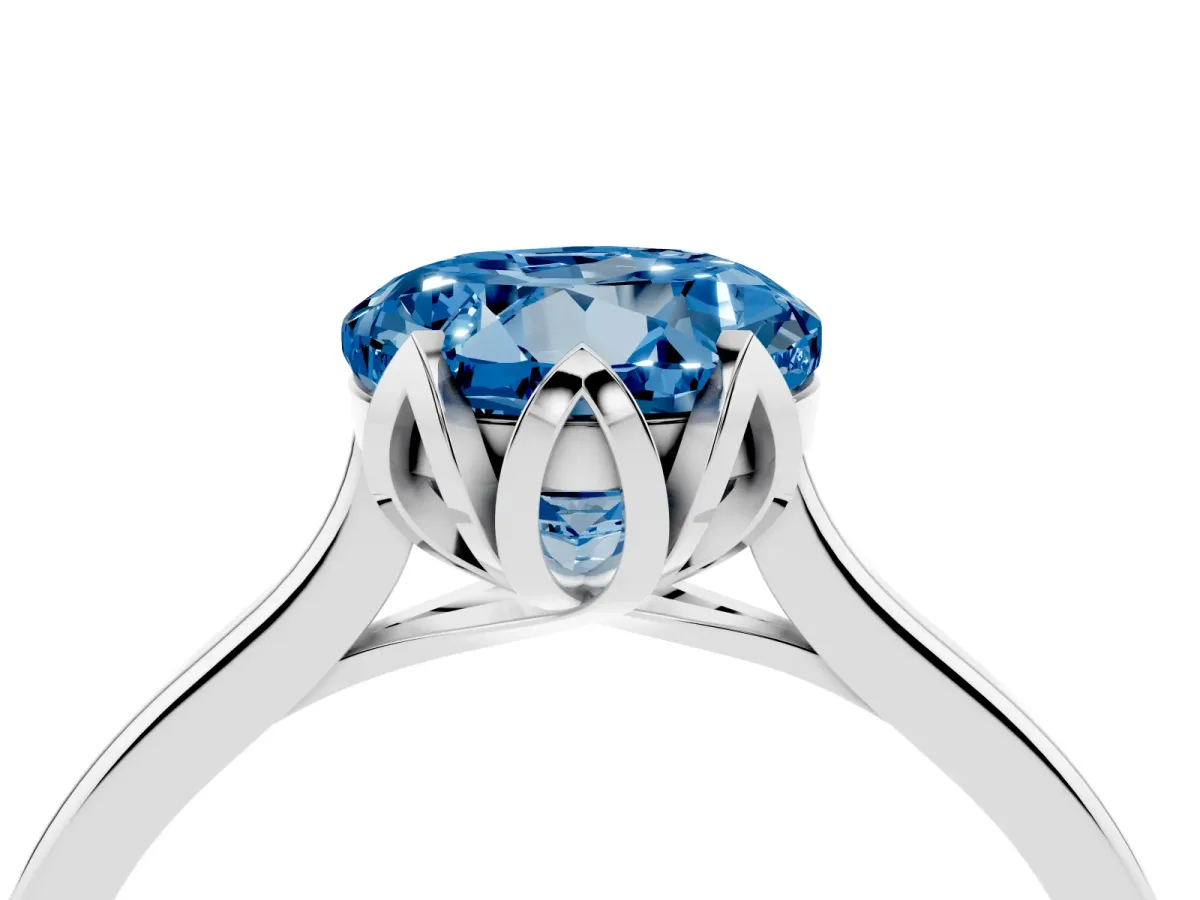 Fancy Blue Round Cut Diamond Solitaire Ring with Flower Prong Setting and Classic Band Silver