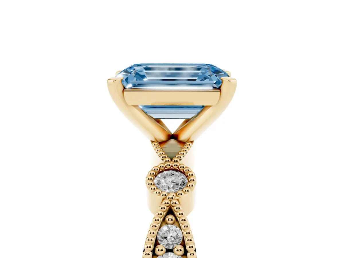 Fancy Blue Emerald Cut Milgrain Bezel Diamond Engagement Ring with Solitaire Prong Setting Yellow gold