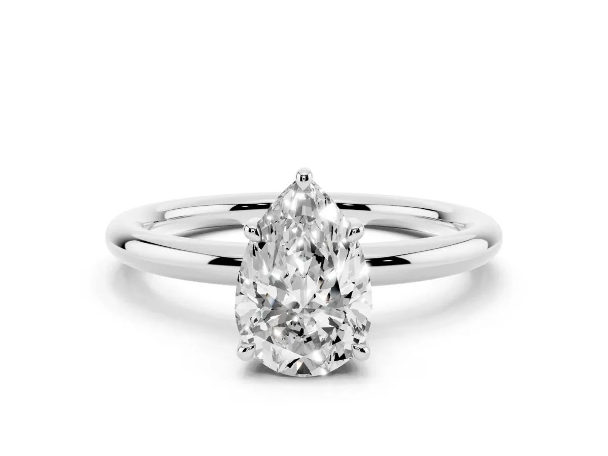 Pear Cut Diamond Solitaire Ring with Thin Band and Four-Prong Setting Silver