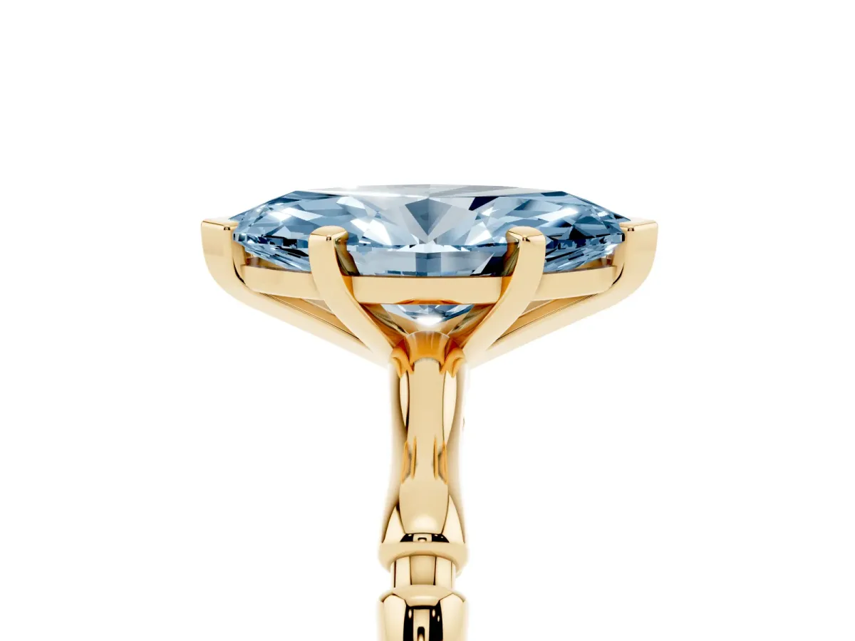 Fancy Blue Marquise Cut Solitaire Diamond Ring with Bamboo Band and Four-Prong Setting Yellow gold