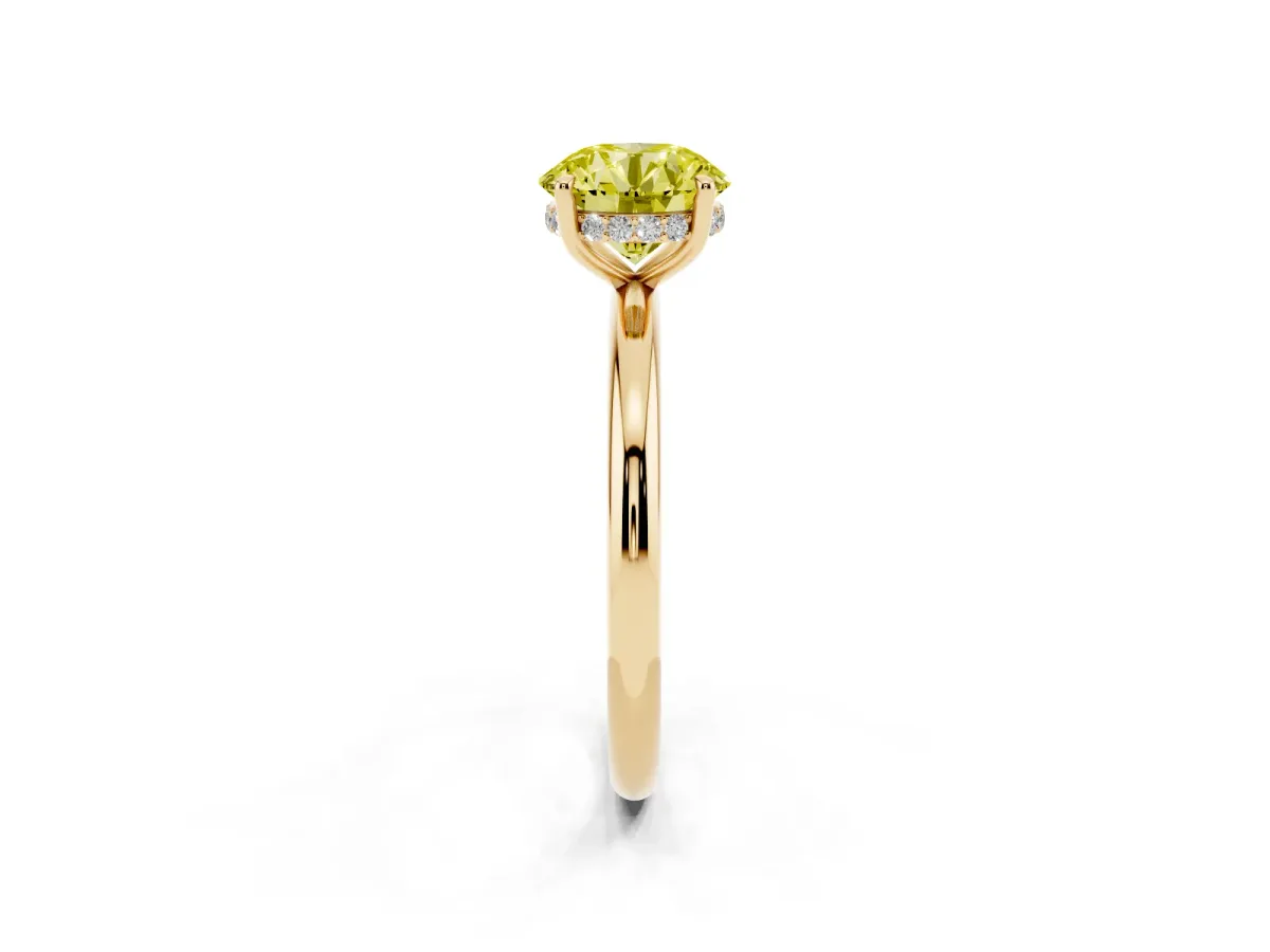 Fancy Yellow Round Cut Diamond Solitaire Ring with Thin Band and Four-Prong Setting Yellow gold
