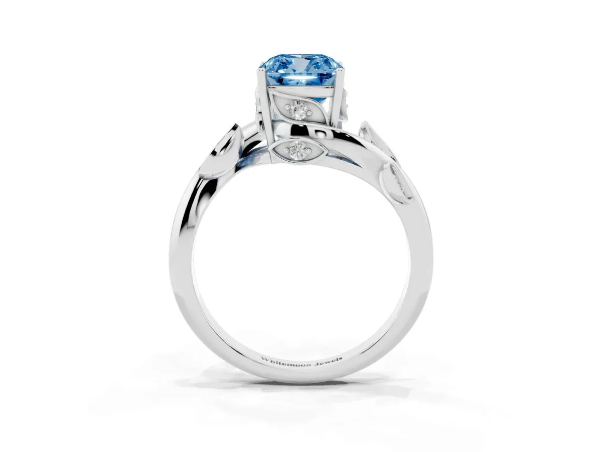 Fancy Blue Cushion Cut Solitaire Twist Engagement Ring with Leaf Accents and Prong Setting Platinum