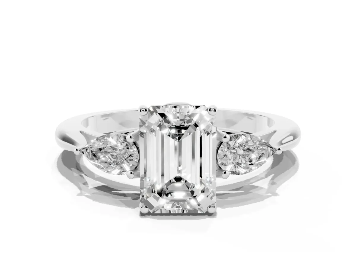 Three-Stone Emerald Cut Diamond Ring with Pear Side Stones in Four-Prong Setting Platinum