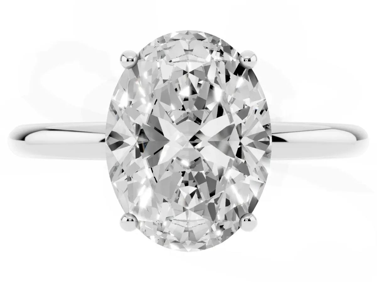 Oval Cut Solitaire Diamond Ring with a Classic Band and Four-Prong Setting Platinum
