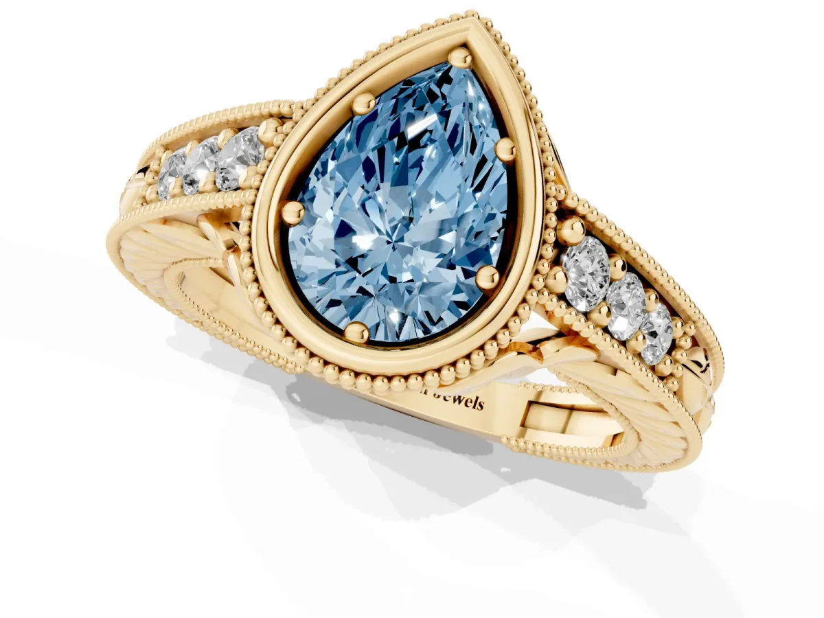 Fancy Blue Bezel Set Pear Cut Diamond Milgrain Pave Engagement Ring Yellow gold