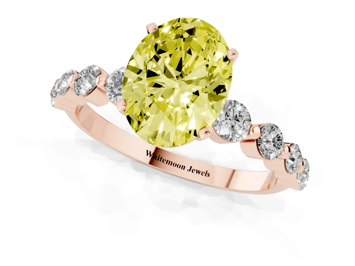 Fancy Yellow Oval Cut Solitaire Diamond Ring with Pave Band and Four-Prong Setting Rose gold