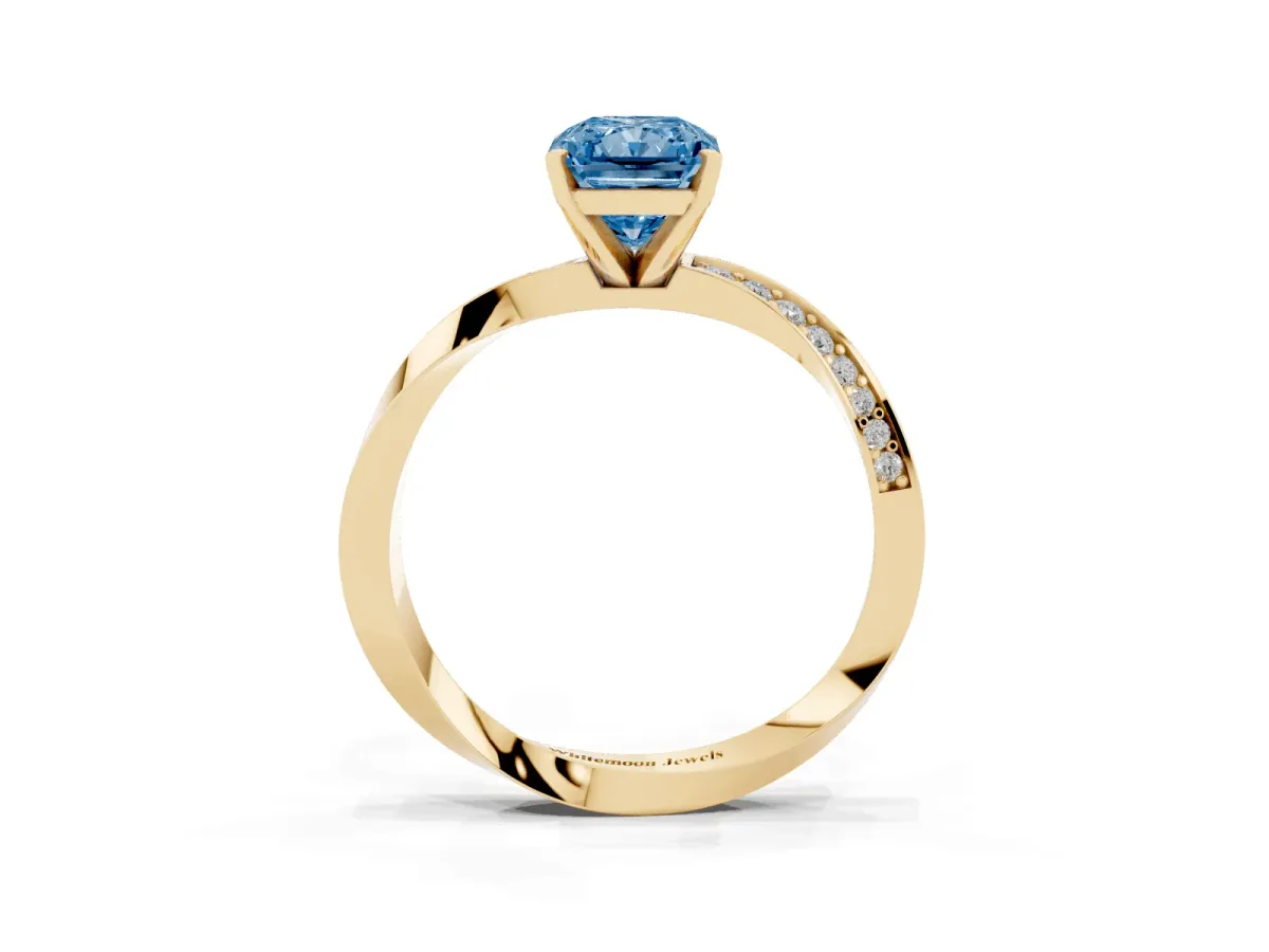 Fancy Blue Radiant Cut Diamond Engagement Ring with Side Stone Accents and Four-Prong Setting Yellow gold