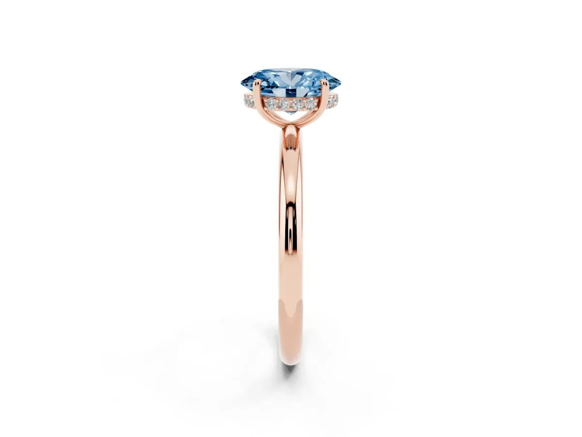 Fancy Blue Oval Cut Diamond Solitaire Ring with Thin Band and Four-Prong Setting Rose gold