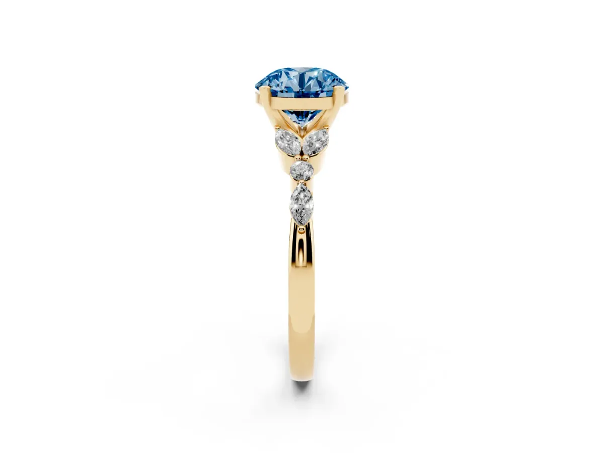 Fancy Blue Round Cut Diamond Solitaire Ring with Side Stones and Four-Prong Setting Yellow gold