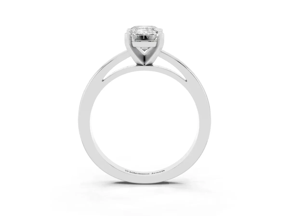 Emerald Cut Solitaire Diamond Engagement Ring with Four-Prong Setting on a Classic Band Silver