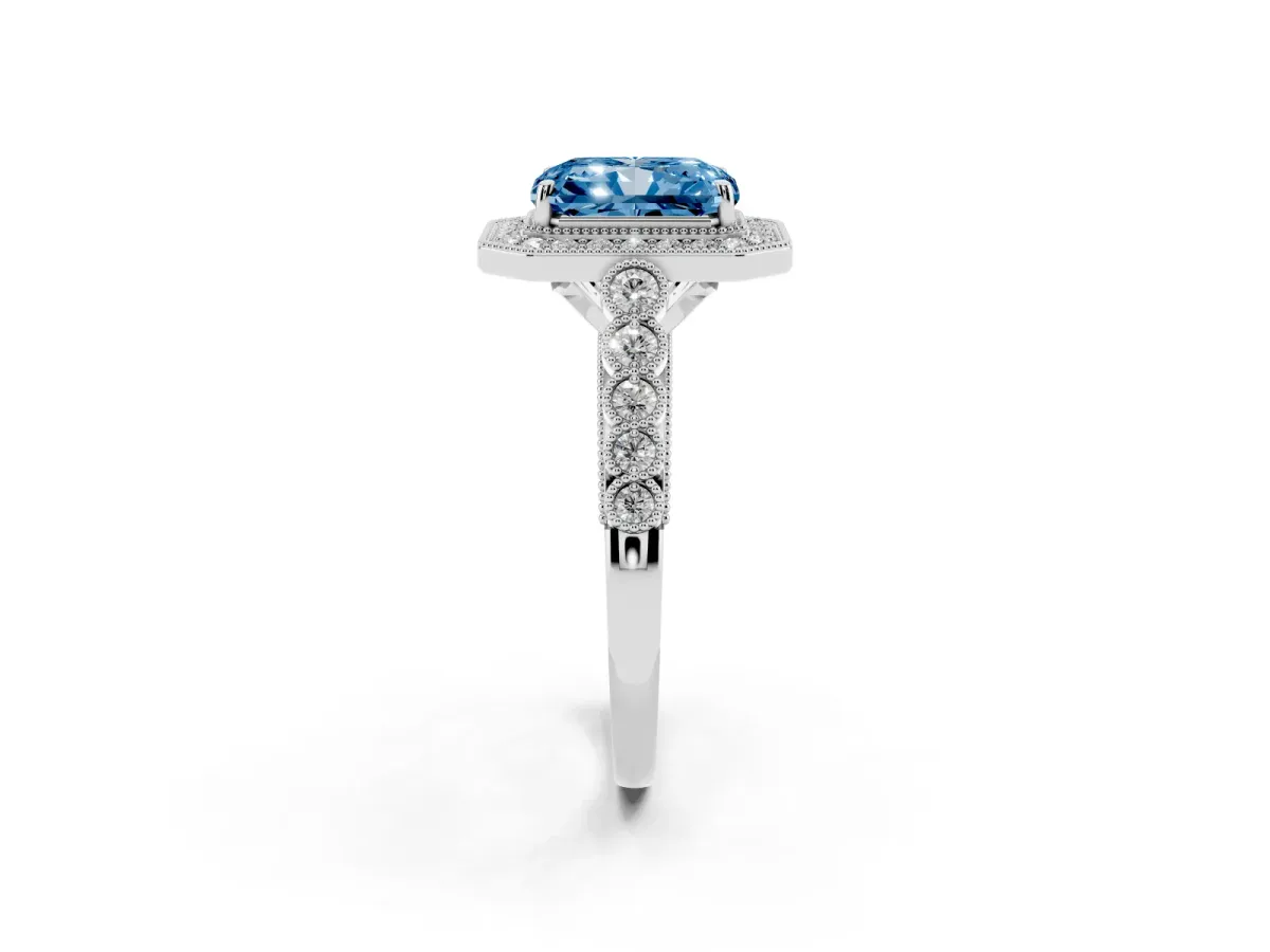 Fancy Blue Radiant Cut Halo Milgrain Solitaire with Bezel Set Side Stones and Pave Band White gold