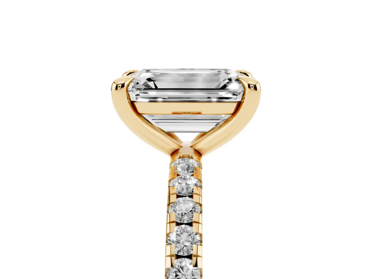 Emerald Cut Diamond Brilliant Solitaire Ring with Pavé Band and Four-Prong Setting Yellow gold