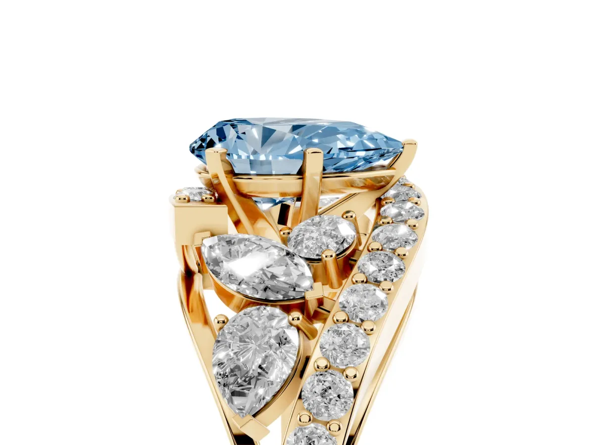 Fancy Blue Pear Cut Diamond Halo Ring with Marquise and Pavé Band in Prong Setting Yellow gold