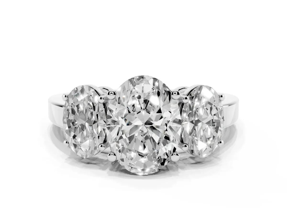 Three-Stone Oval Cut Cut Diamond Engagement Ring with Flat Band and Four-Prong Setting Silver