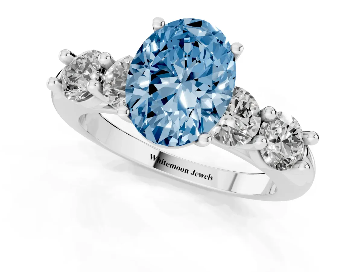 Fancy Blue Oval Cut Cut Five-Stone Prong Set Diamond Ring with Classic Band Silver