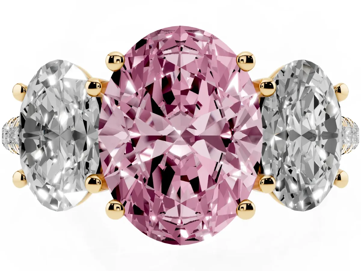 Fancy Pink Three-Stone Oval Cut Diamond Ring with Round Pavé Band and Prong Setting Yellow gold