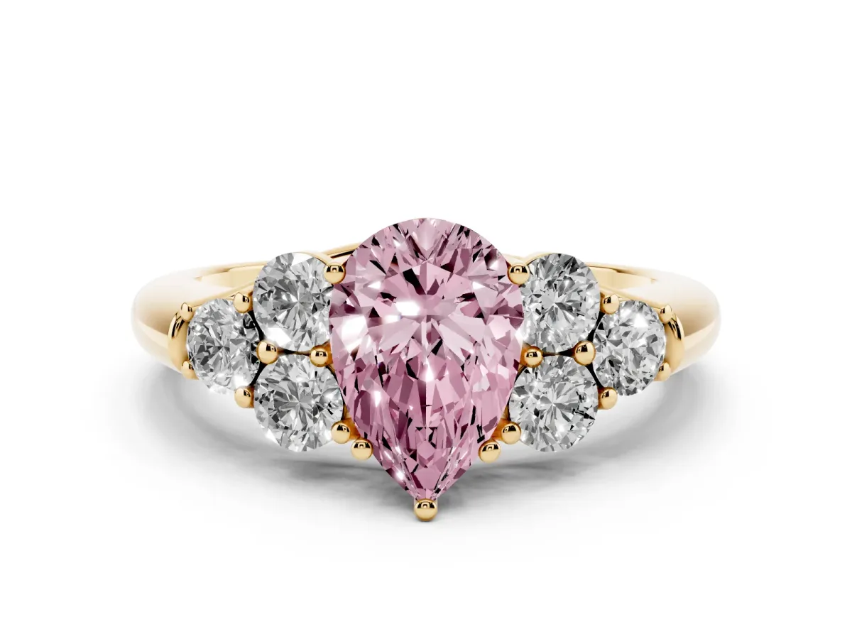 Fancy Pink Pear Cut Cut Diamond Cluster Ring with Round Accent Stones and Prong Setting on a Classic Band Yellow gold