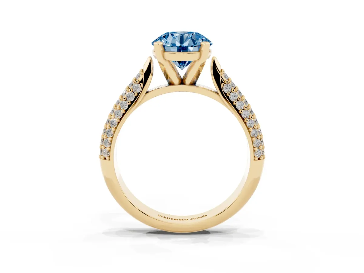 Fancy Blue Round Cut Diamond Solitaire Engagement Ring with Multi-Row Round Pavé Band and Prong Setting Yellow gold