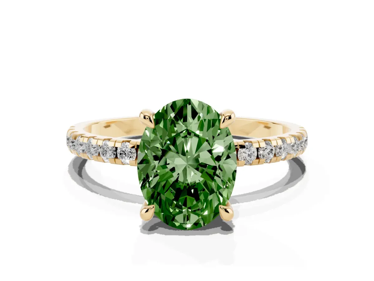 Fancy Green Oval Cut Diamond Brilliant Solitaire Ring with Pavé Band and Four-Prong Setting Yellow gold