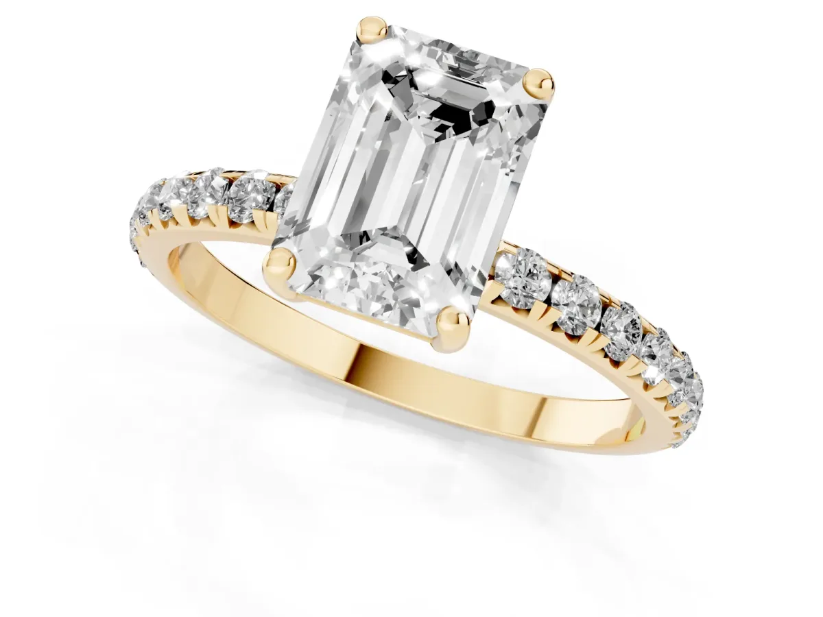 Emerald Cut Cut Diamond Solitaire Ring with Micro Pave Band and Four Prong Setting Yellow gold