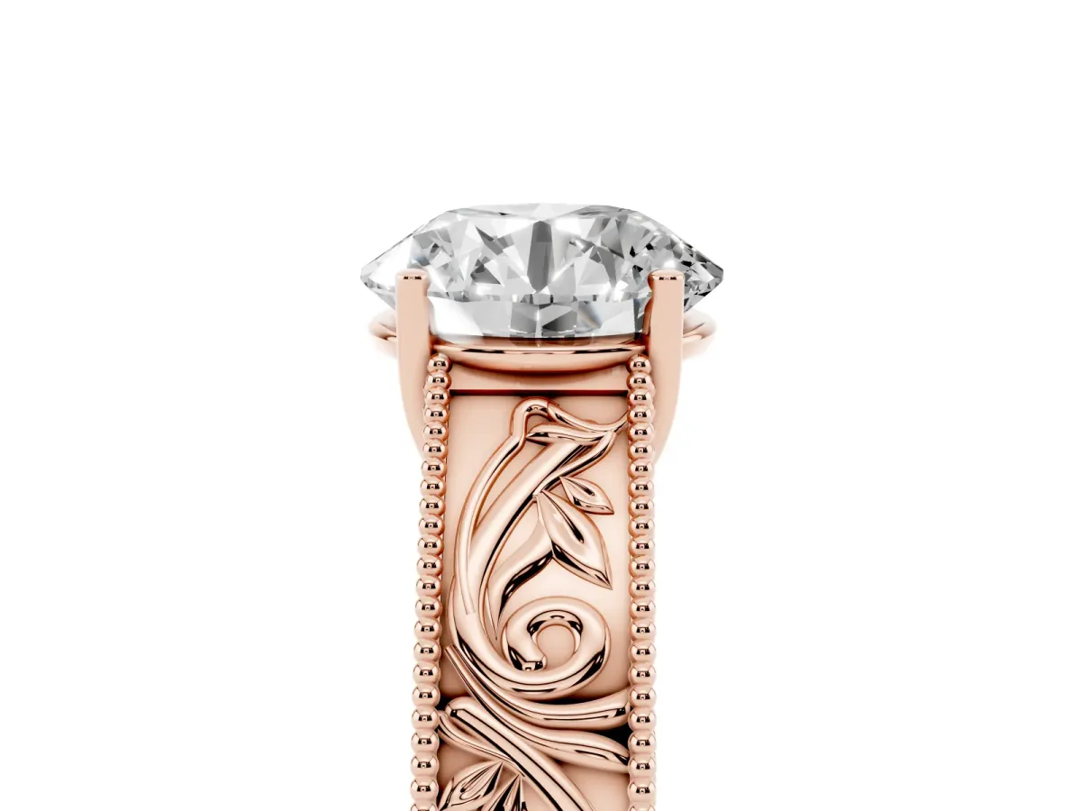 Round Cut Diamond Solitaire Ring with Engraved Band and Four-Prong Setting Rose gold