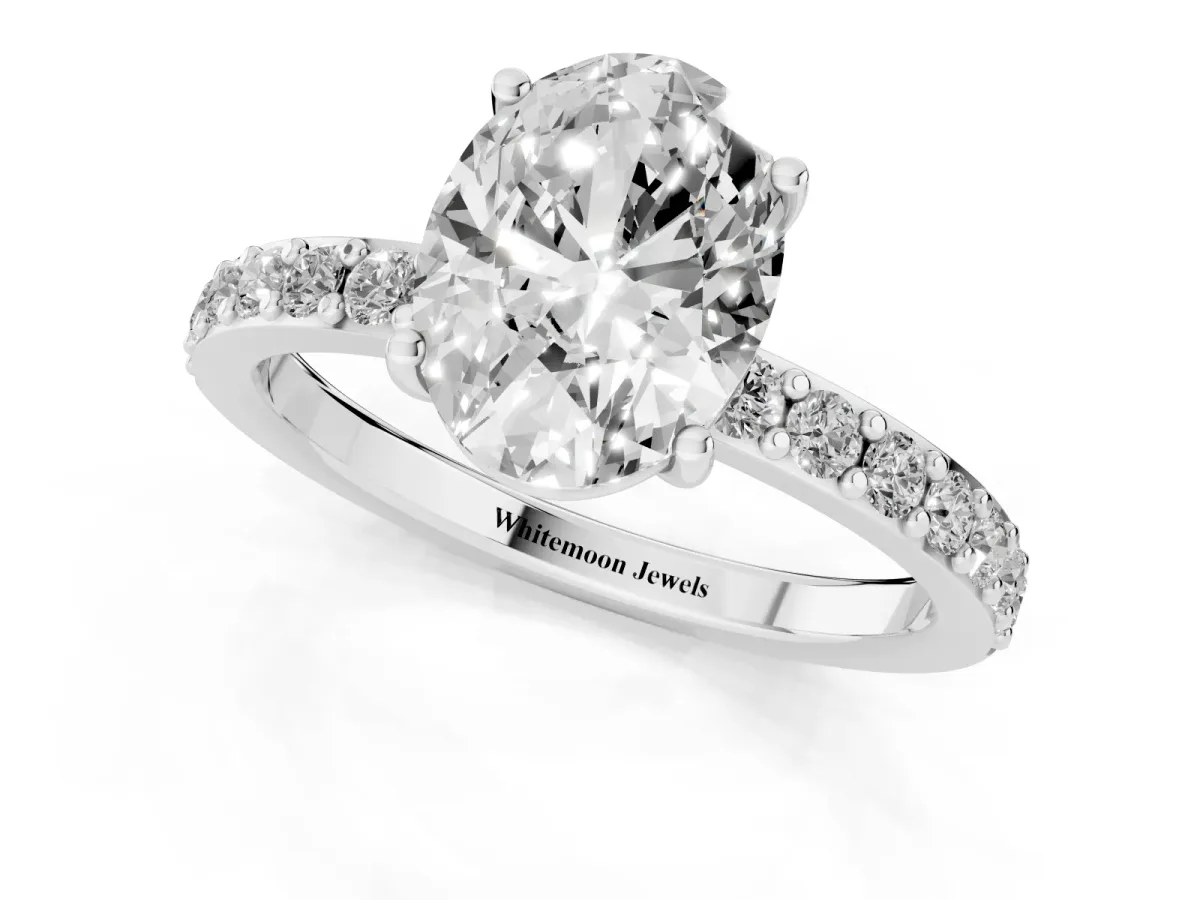 Oval Cut Cut Diamond Solitaire with Pave Band and Four-Prong Setting Silver