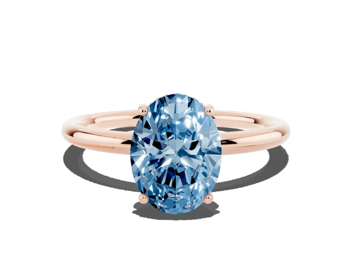 Fancy Blue Oval Cut Solitaire Diamond Ring with a Classic Band and Four-Prong Setting Rose gold