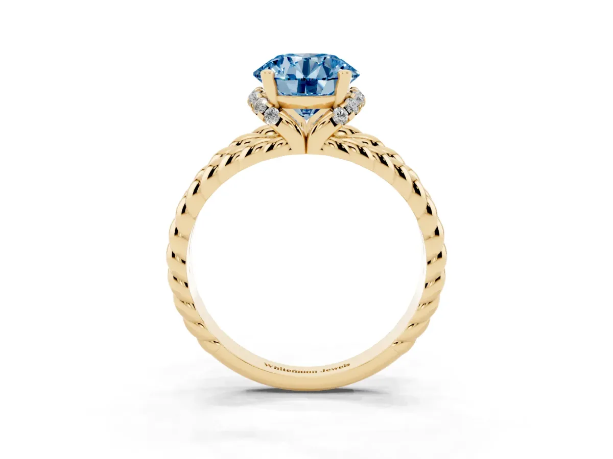 Fancy Blue Round Cut Halo Twisted Band Four-Prong Ring Yellow gold